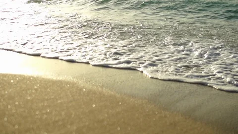 Ocean waves lapping sand in slow motion Stock Footage 104269365