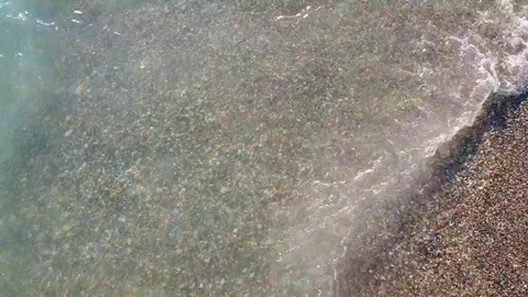 Ocean waves lapping on shore Stock Footage 114313464