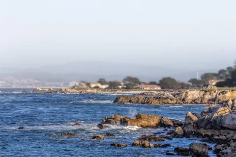 Ocean waves at lover's point in pacific grove Stock Photos