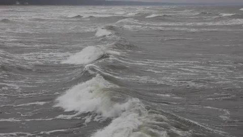 Ocean waves moving toward coastline from drone. Aerial waves toward coast. Stock Footage 329622876