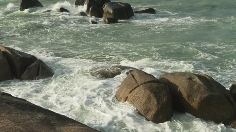 Ocean waves over big rocks Stock Footage 331008876