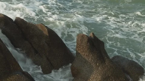 Ocean waves over big rocks Stock Footage 331124835