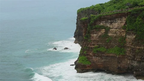 Ocean waves over high cliffs Stock Footage 72448078