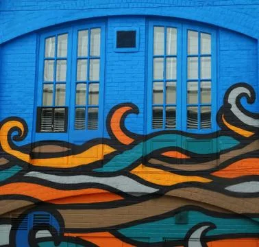 Ocean Waves Painted On A Building Stock Photos