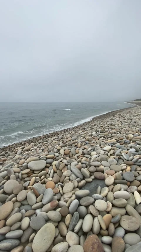 Ocean Waves on Pebble Beach with Smooth Stones 🌊 – Tranquil Beach Scene 動画素材 311110527