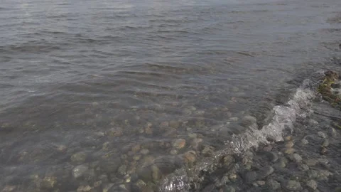 Ocean waves on pebbles Stock Footage