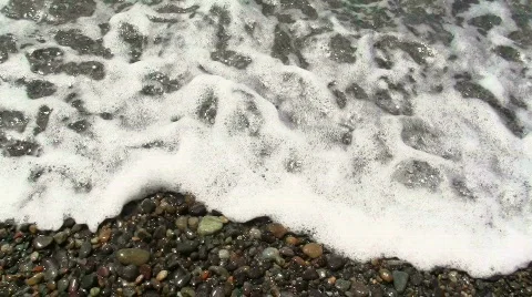 Ocean waves on pebbles V1 - HD Stock-Footage 779372