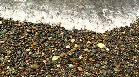 Ocean waves on pebbles V2 - HD 스톡 동영상 779356