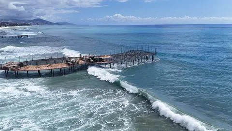 Ocean waves pier. Stock Photos