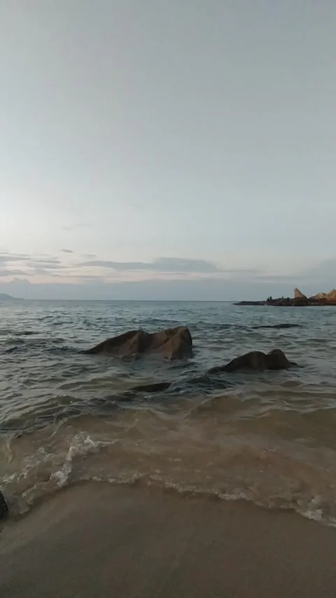 Ocean Waves On Rocks 4K Beach Stock Footage 335939113