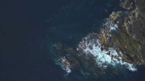Ocean waves on the rocks aerial view from 4k drone Stock Footage 90924131