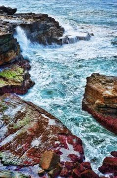 Ocean waves on rocks Stock Photos