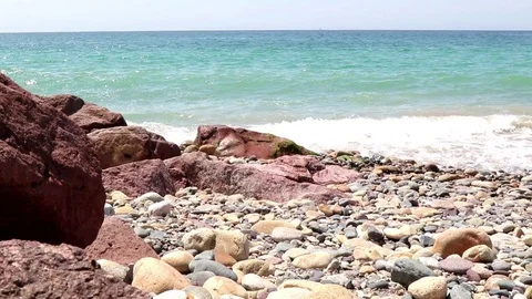 Ocean waves, rocky beach and skyline Stock Footage 78042834