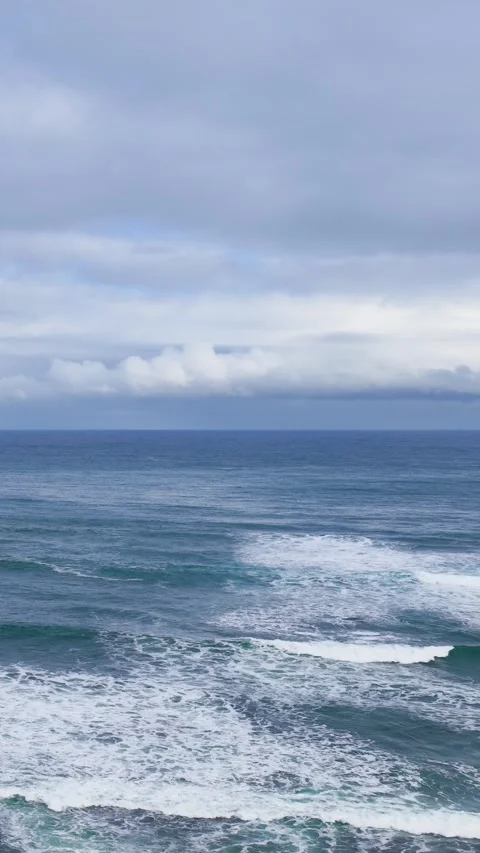Ocean Waves Rolling Beneath Overcast Cloudy Sky at Flinders Stock Footage 346738002