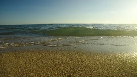 Ocean waves rolling during the sunset Stock Footage 212905155