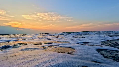 Ocean waves rolling over the camera Видео 336934548