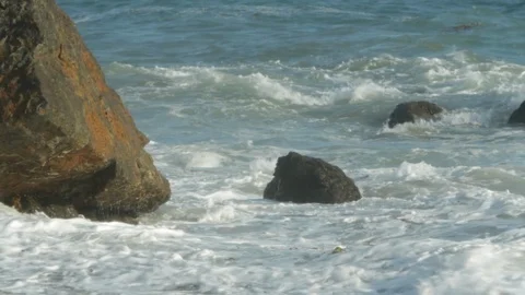 Ocean waves. Rolling over rocky beach. slomo C Video stock 102402137