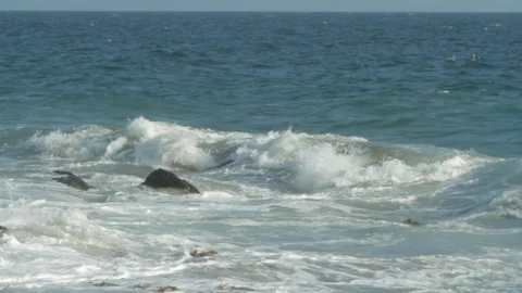 Ocean waves. Rolling over rocky beach. slomo A Stock Footage 102402162
