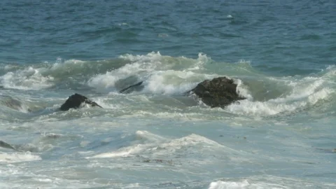 Ocean waves. Rolling over rocky beach. slomo B Stock Footage 102402174