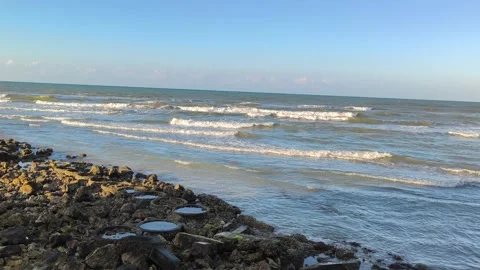 Ocean Waves Rolling on Rocky Shoreline with Tide Pools Stock Footage 340338321