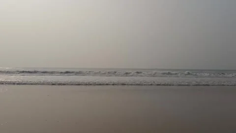 Ocean Waves Rolling onto Sandy Beach 스톡 동영상 331114187