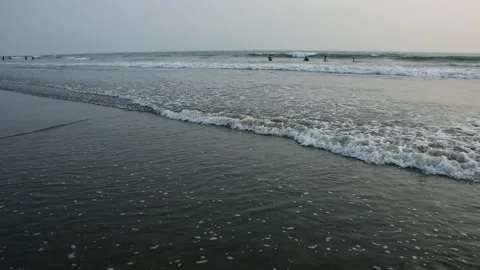 Ocean Waves Rolling onto Sandy Shore Stock-Footage 331765698