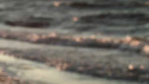 Ocean Waves Rolling into Shore, Abstract Out of Focus with Pink Lens Flare Stock Footage 185097240