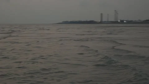 Ocean Waves Rolling On Shore At Dusk With Distant Coastline Stock Footage 239172845