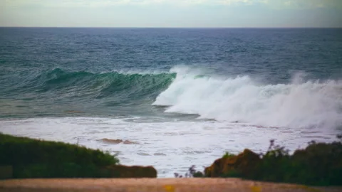 Ocean waves rolling shore in slow motion. Stormy dark sea breaking shallow reef Stock Footage 237559665