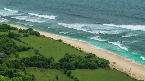 Ocean waves rolling on the tropical sandy beach Stock Footage 122242061