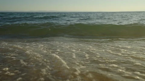 Ocean waves rushing at sunset Stock Footage 212912057