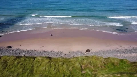 Ocean waves sand ocean coast walking above drone footage 2.7k Video stock 209194328