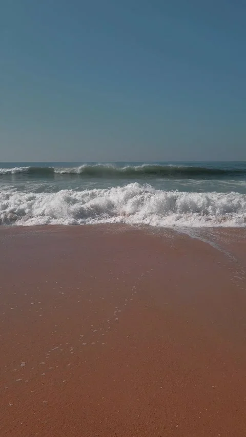 Ocean waves at sandy beach Stock Footage 252663699