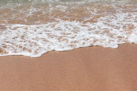 Ocean Waves On Sandy Beach Foto stock