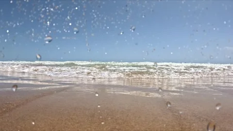 Ocean waves seen underwater. Camera moves in and out, showing the surface a.. Stock Footage 280255823