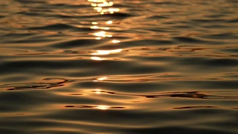 Ocean waves in slow motion at sunrise Stock Footage