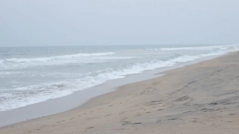Ocean Waves softly crash onto the beach at El Casa Del Papa Beach Stock Footage 111310337