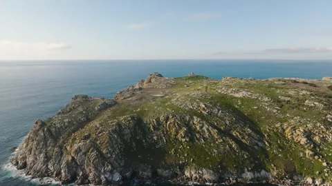 Ocean Waves Splashing On The Coast An Old Lighthouse. aerial, zoom-in Stock Footage 240482190