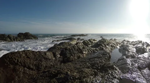 Ocean Waves Splashing on Rocks Stock Footage 48831214