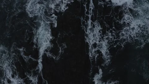 Ocean waves splashing on rocks 動画素材 243668549