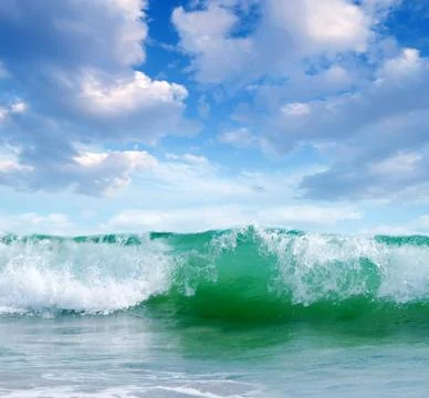 Ocean waves on a sunny day Stock Photos