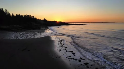 Ocean waves at Sunrise by Aerial Drone Stock Footage 265934412