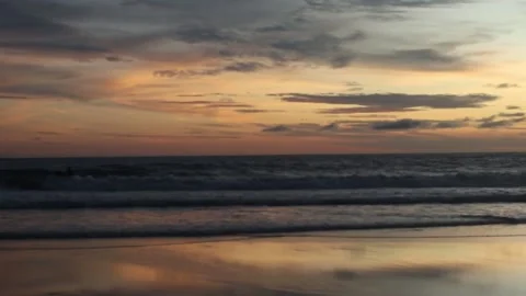 Ocean waves at sunset Bali beach Stock Footage 276545476