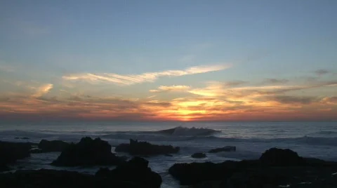 Ocean waves at sunset Stock Footage 119571