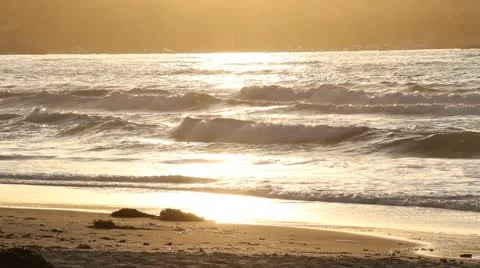 Ocean waves at sunset Stock Footage 21541754