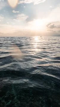 Ocean Waves At Sunset Stock-Fotos