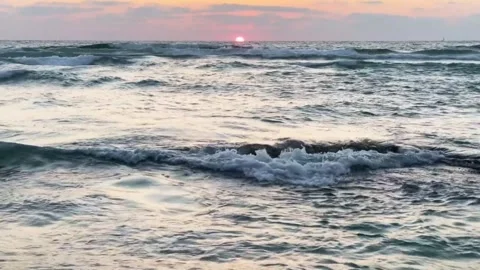 Ocean-Waves-Sunset-Serene-Coastal-View Stock Footage 317252700