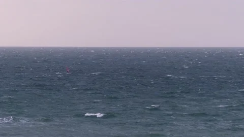Ocean waves with surfers - view from the steep coast - natural water background Stock Footage 143858344