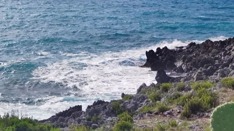 Ocean Waves. Swimming with Ocean Waves Collides with Large Rocks Breaking. Stock Footage 220663370