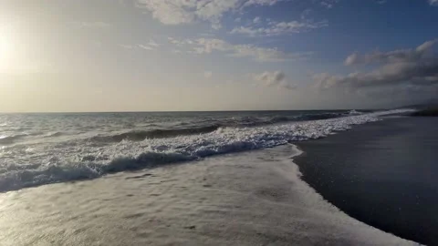 Ocean Waves. Swimming with Ocean Waves on the Tropical Coast in Calabria. Stock Footage 220665326